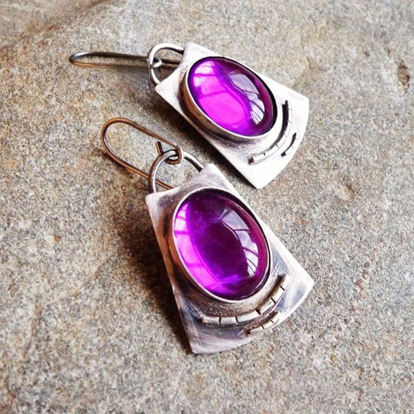 Handmade vintage women's earrings inlaid with rubies