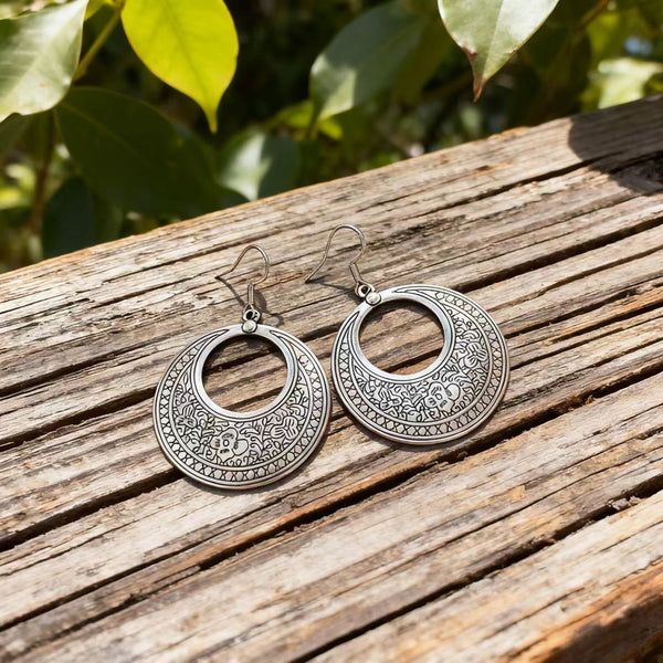 Handmade Bohemian Silver Earrings with Intricate Circular Design